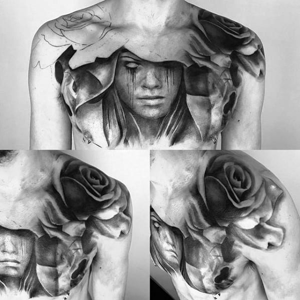 Black and grey chest tattoo featuring a sorrowful woman with tears, surrounded by large roses and surreal abstract shading.