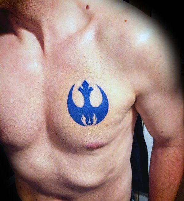 Shirtless person with a blue tattoo of the Rebel Alliance symbol on the left side of their chest