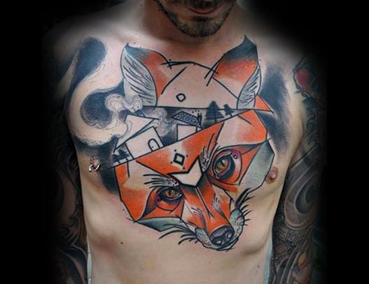Geometric surreal fox tattoo on chest, blending sharp orange shapes with dreamy black and grey scenery inside the fox's head.