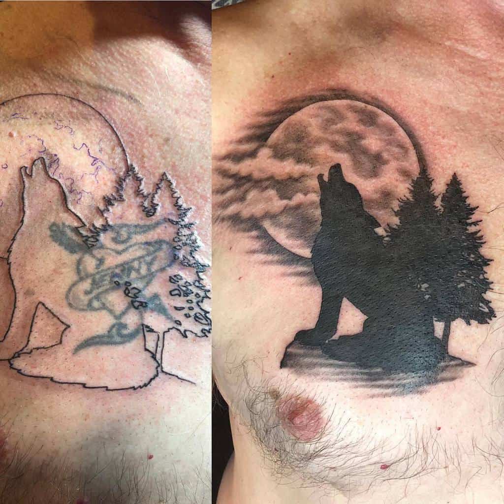 Tattoo of wolf silhouette howling at moon