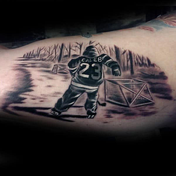 Child Hockey Player Mens Bicep Tattoos