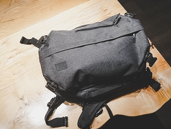 Chrome Industries Summoner Backpack Review On Wood Table