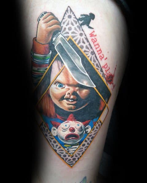 Chucky tattoo with a bold geometric frame, featuring his menacing grin, a large knife, a frightened clown, and the phrase "Wanna play?"
