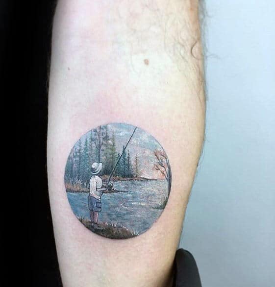 Circle Badass Small Mens Boy Fishing At Lake Tattoo On Outer Forearm