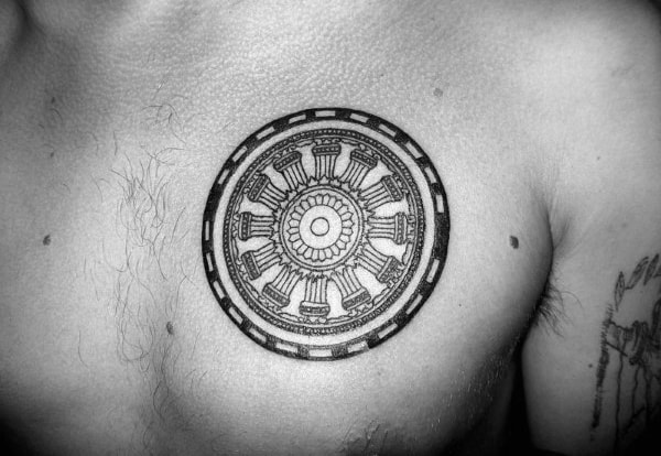Circle Dharma Wheel Upper Chest Tattoos For Guys