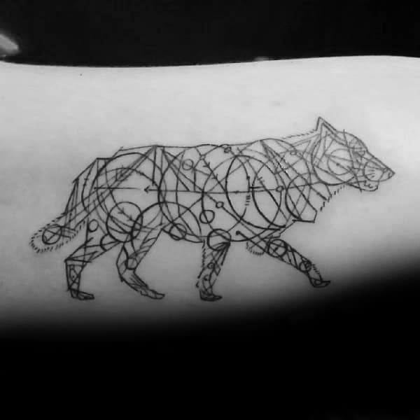 A striking geometric wolf tattoo elegantly adorns the wearer's skin, capturing the wild spirit with artistic precision