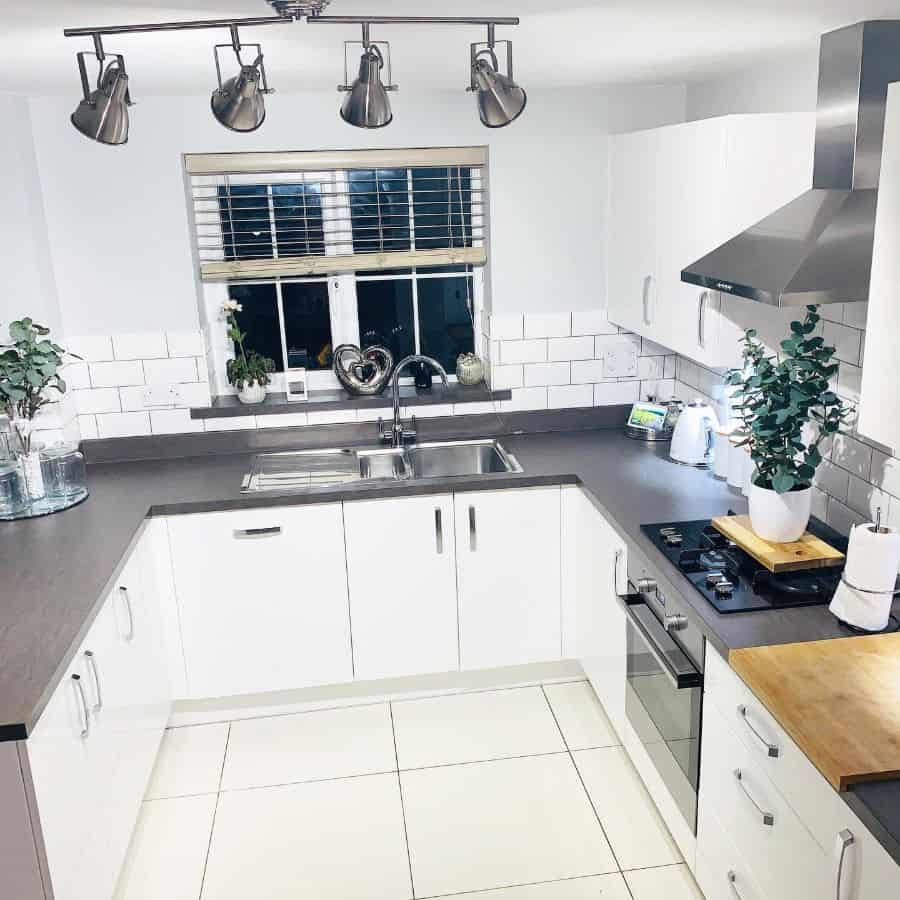 classic modern kitchen white wall and floor tiles