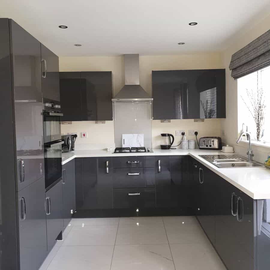 gray cabinet kitchen glossy white floor tiles