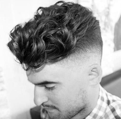 Classic Popular Mens Curly Undercut Hairstyle With High Fade On Back Of Head