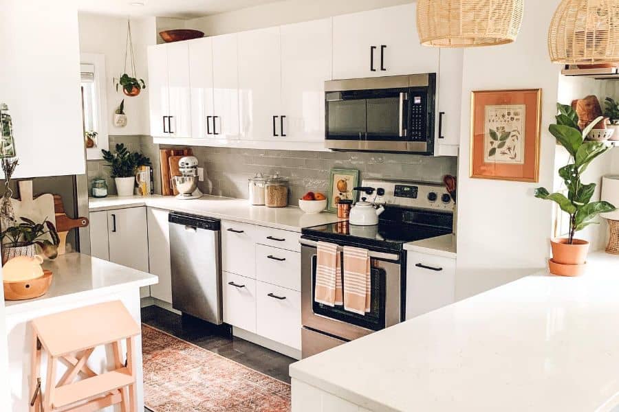 rustic white cabinet kitchen with black accents