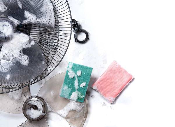 cleaning dirty electric fan