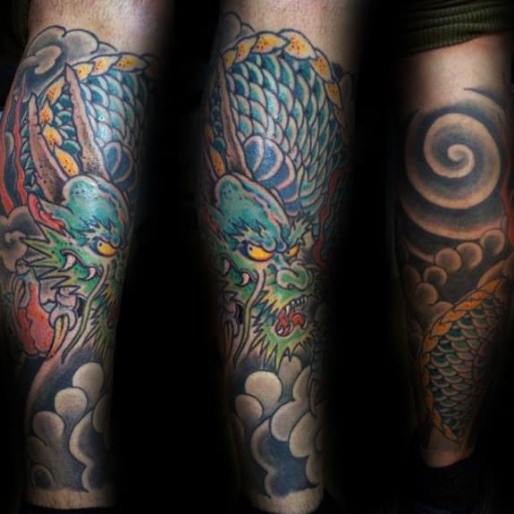 Clouds With Green Dragon Mens Leg Tattoo Ideas
