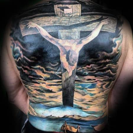 Cloudy Sky Jesus On The Cross Christian Back Tattoo Ideas For Guys