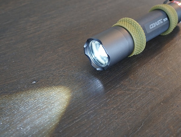 Coast Tx7r Flashlight With Light On Solid Led Beam