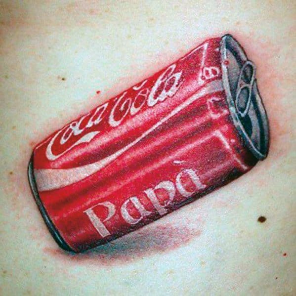 Realistic Coca-Cola can tattoo with a custom "Papá" label, detailed shading, and highlights for a lifelike 3D effect on the skin.