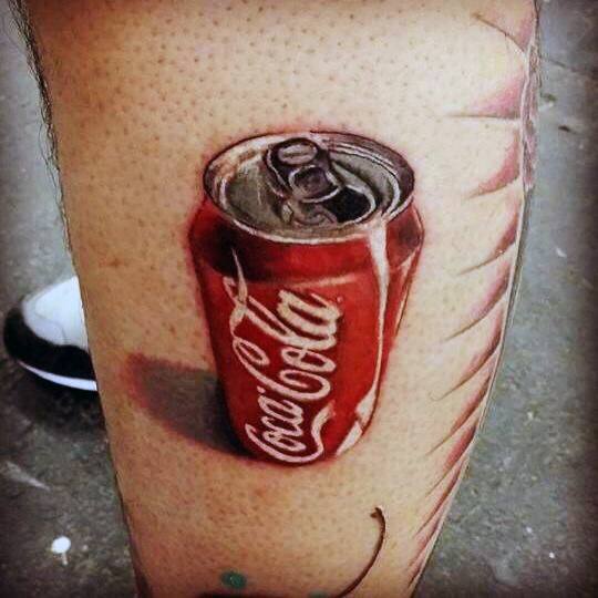 Realistic Coca-Cola can tattoo with detailed shading, highlights, and a 3D effect, creating the illusion of a crushed can on the skin.