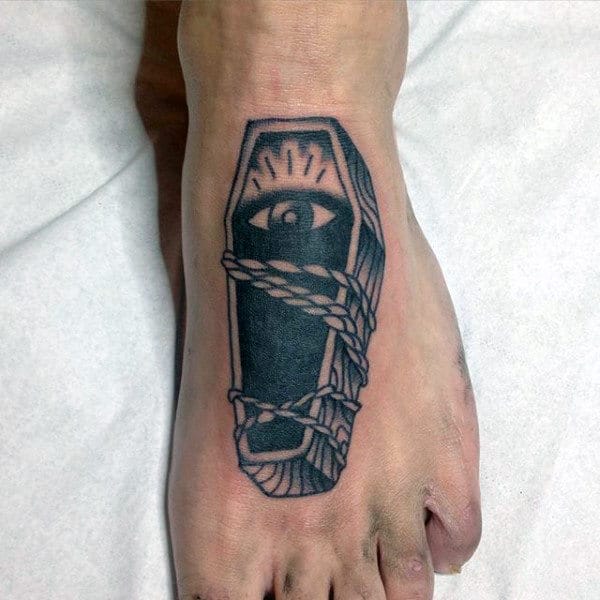 Coffin Wih Eye And Roped Mens Foot Tattoo