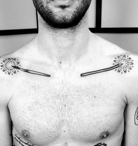 A man with intricate dandelion tattoos on his chest, their delicate lines resembling a fine pencil sketch