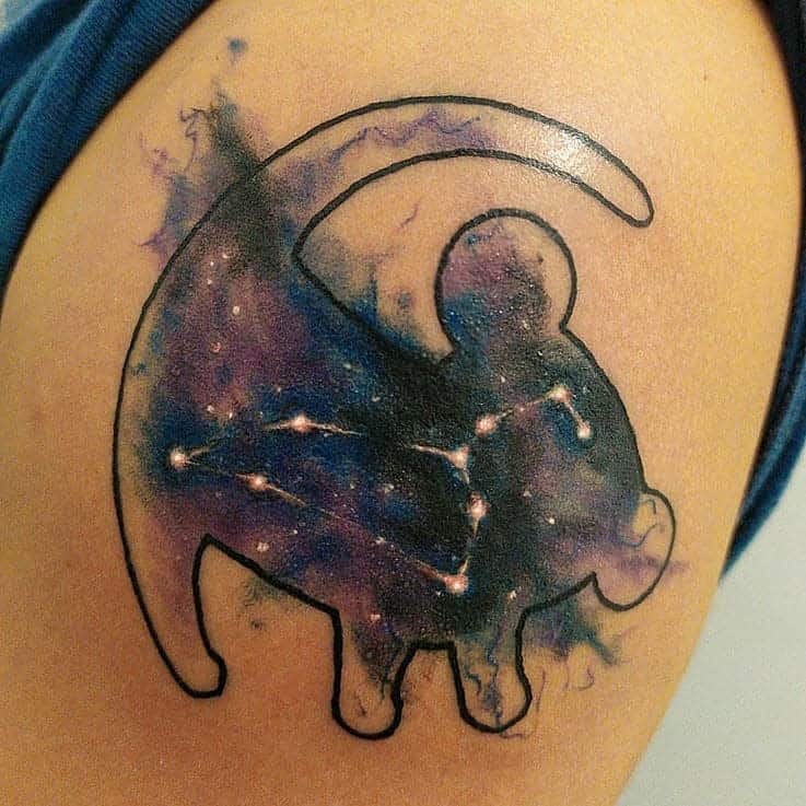 Leo constellation tattoo with a cosmic lion outline, blending astrology and galaxy-inspired watercolor effects.