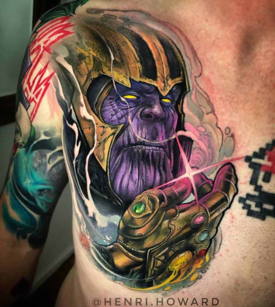 A vibrant and colorful tattoo of Thanos, showcasing his menacing face with glowing eyes and holding the gauntlet with the Infinity Stones