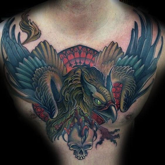 Colorful Griffin With Skull Mens Chest Tattoos