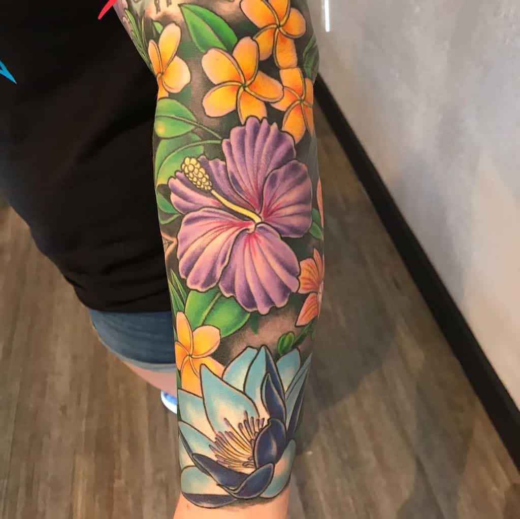 Colorful hawaiian flower tattoo