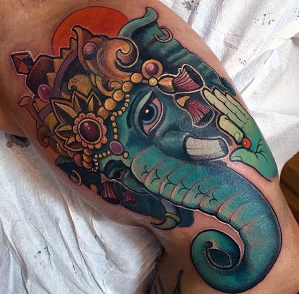 Colorful New School Male Ganesh Tattoo On Inner Arm Biceps