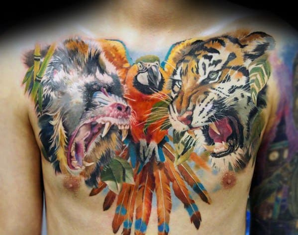 Vibrant chest tattoo featuring a fierce baboon, roaring tiger, and colorful parrot, blending realism with bold details for a dynamic wildlife design.