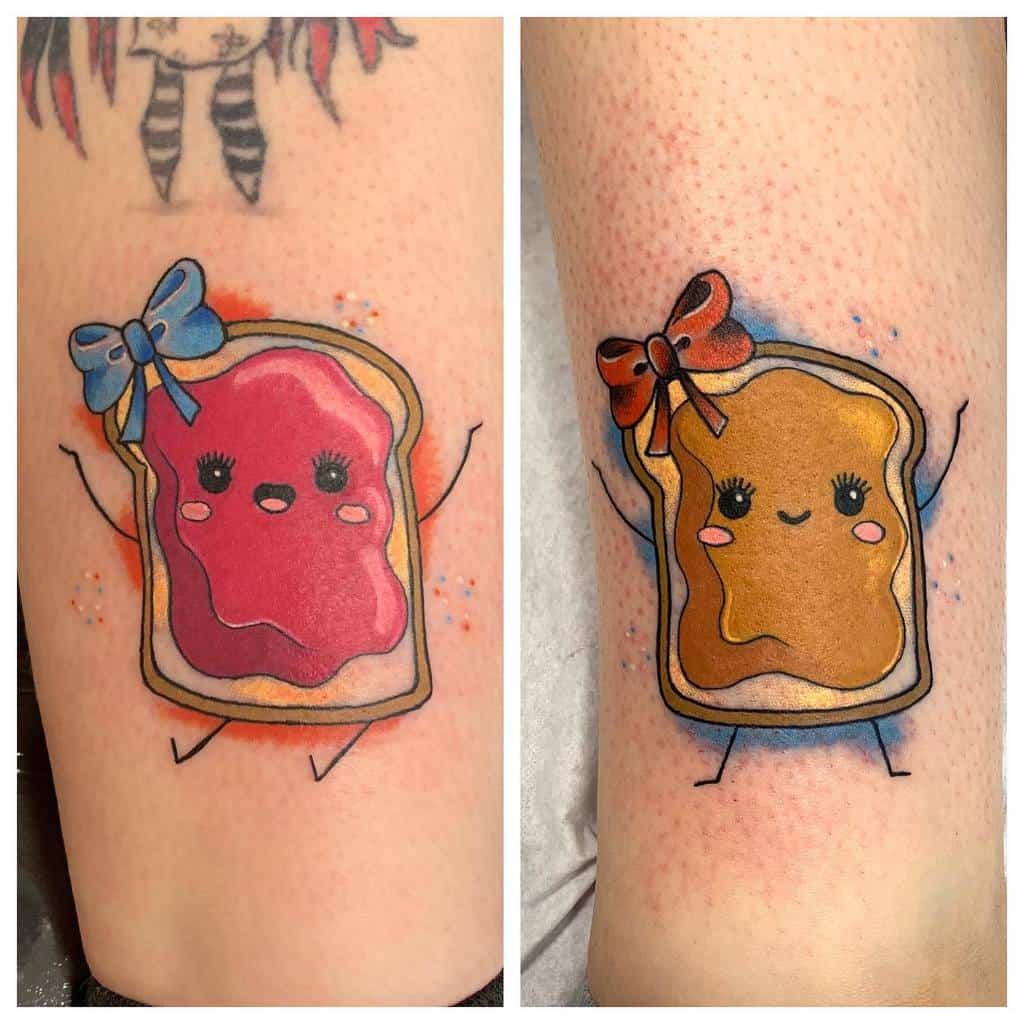 Matching sister tattoos featuring cute cartoon peanut butter and jelly slices with smiling faces, bows, and playful expressions