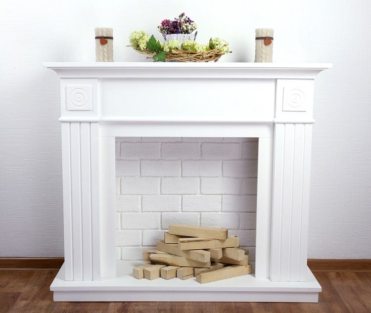 white fireplace and mantel