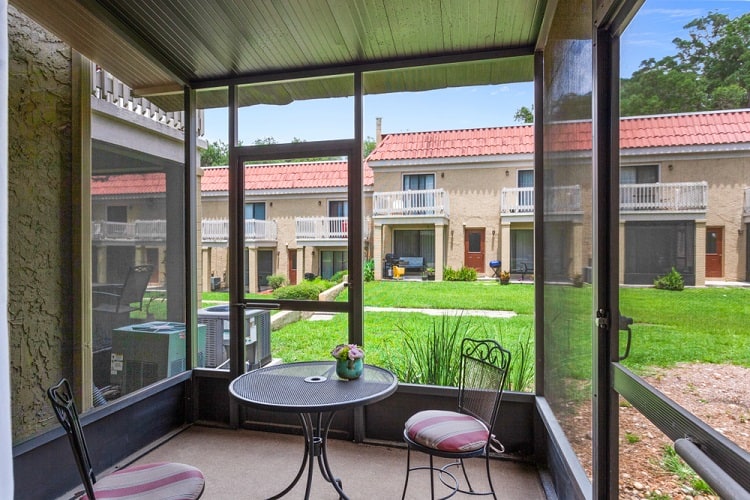 screened porch with outdoor deck