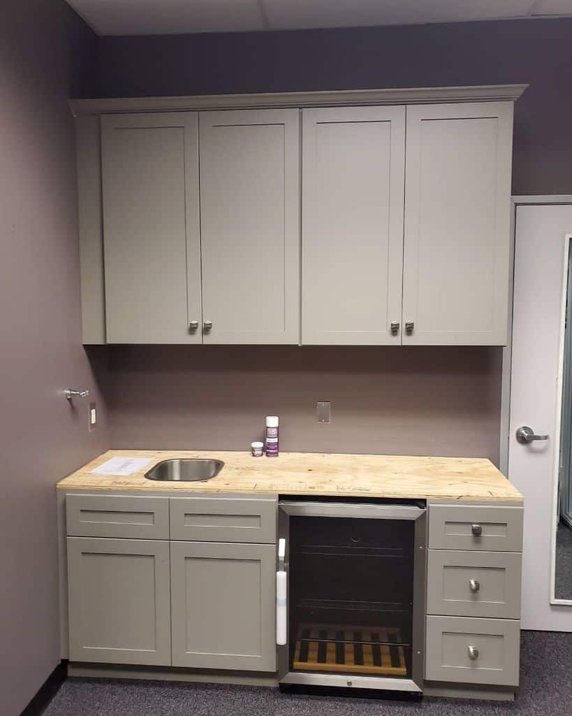 compact simple white kitchenette