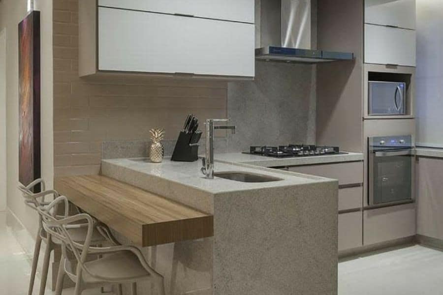 compact gray kitchen with wood counter