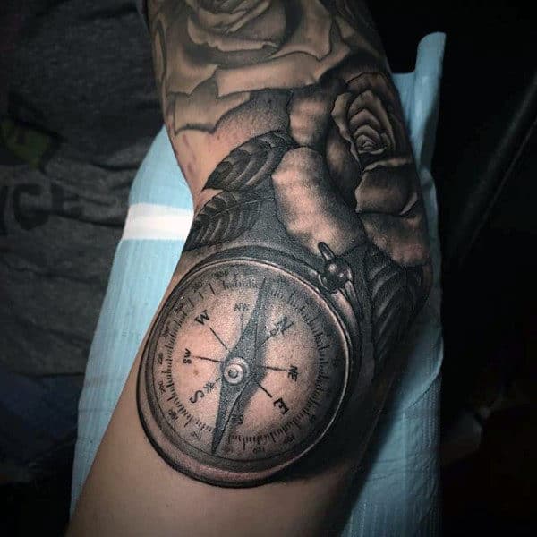 Compass And Rose Male Tattoo On The Elbow