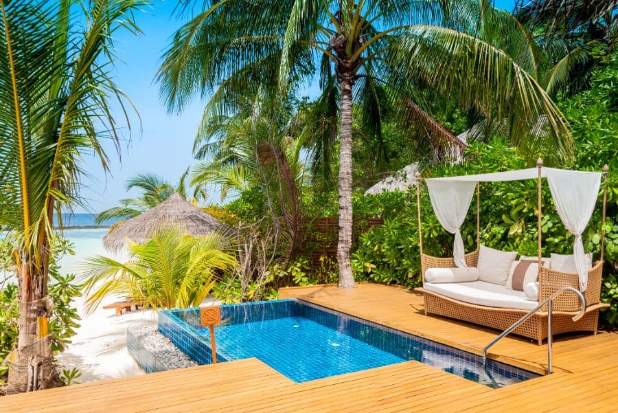 resort wood deck with pool