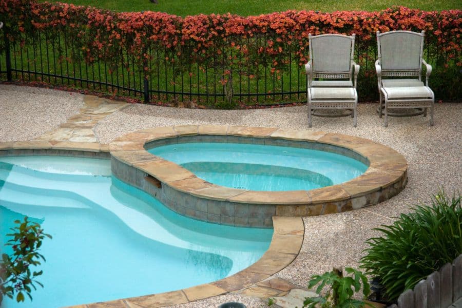 concrete pool deck with spa