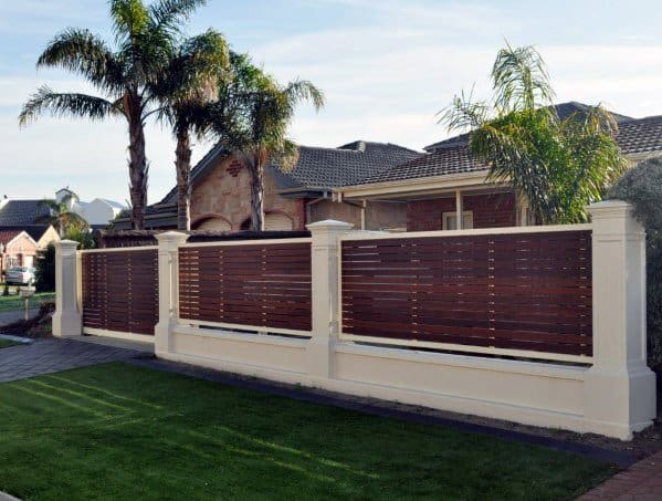concrete with wood slat boards front yard fence