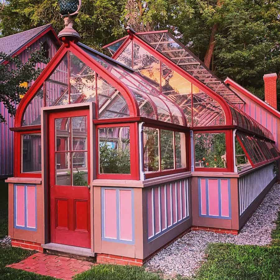 red and pink conservatory greenhouse