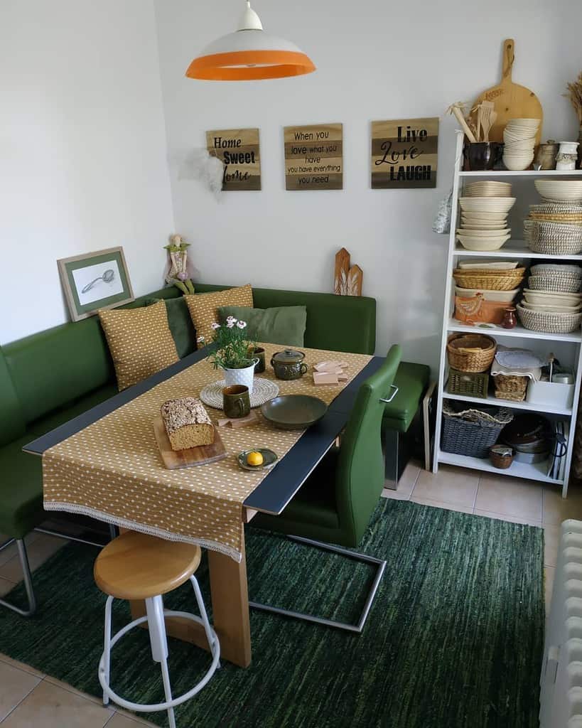 contemporary small dining room with green bench seating