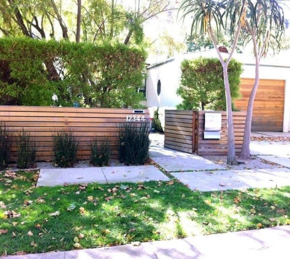 wood plank front yard fence with gate 