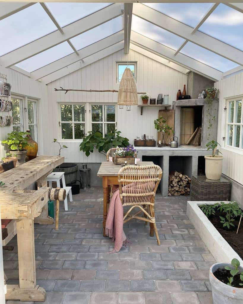 converted greenhouse she shed with work bench 