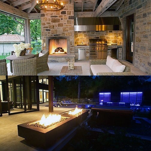 Rustic outdoor kitchen with a stone fireplace and modern poolside fire features illuminated at night.