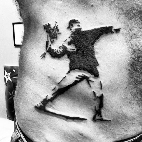 Cool Banksy Guy Throwing Flowers Mens Rib Cage Side Stomach Tattoo