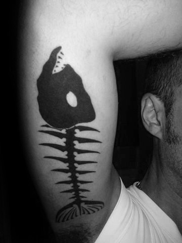 Cool Bold Black Ink Fish Skeleton Tattoo For Men On Inner Arm Bicep