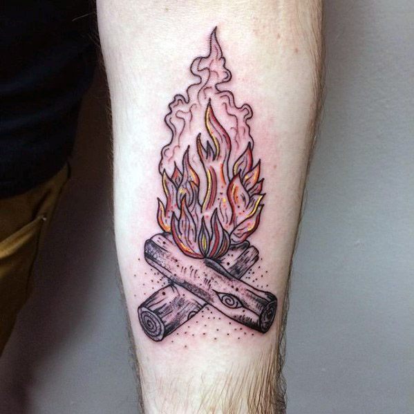 Campfire tattoo with detailed linework logs and layered flames in black, orange, and yellow with subtle dotwork shading.
