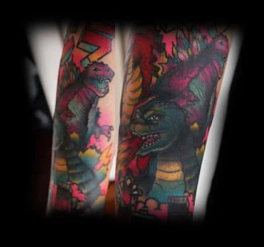 Cool Cartoon Like Godzilla Tattoo Lots Of Color On Guy