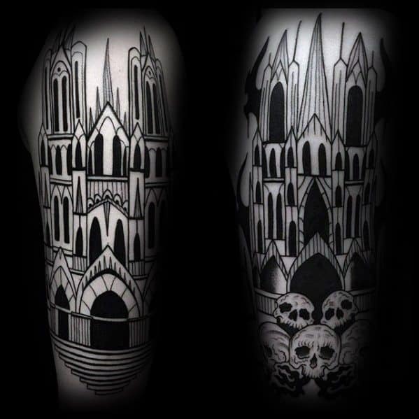 Bold blackwork tattoo of a gothic cathedral with sharp spires and arches, featuring skulls and smoke at the base for a dark theme.