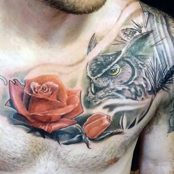 Chest tattoo of a realistic owl and red rose