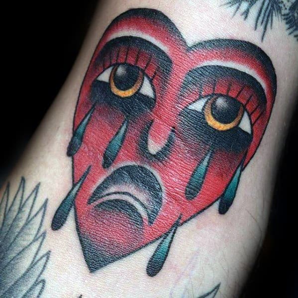 Cool Crying Red Heart With Tears Ditch Tattoo Design Ideas For Male