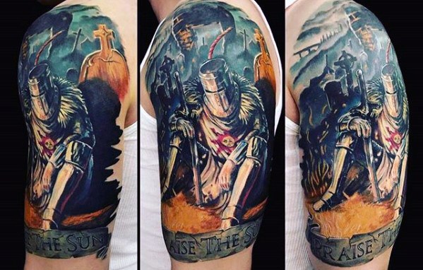 Vivid Dark Souls tattoo of Solaire kneeling at a bonfire in a somber pose, with dramatic lighting and "Praise the Sun" text below.